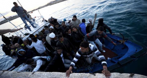 Boat migrants arriving in Lampedusa. Photo by Filippo Monteforte/AFP